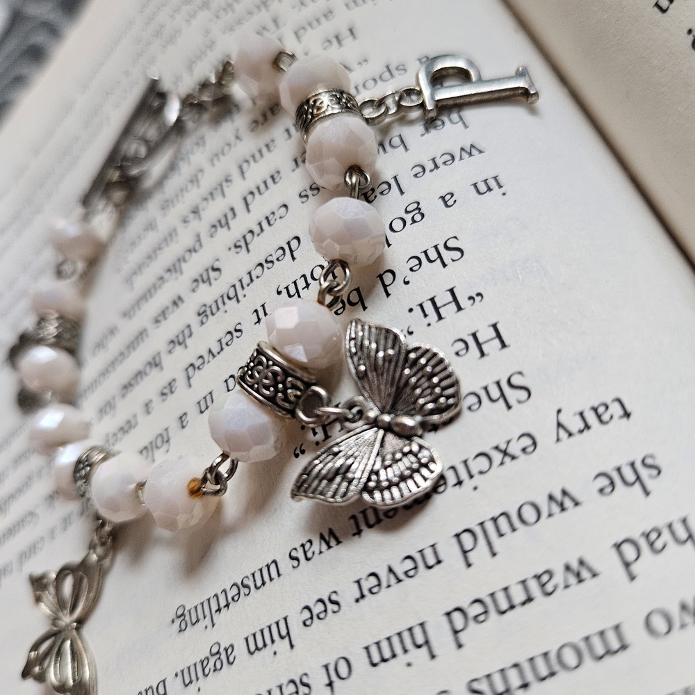 Delicate Pale Pink Beaded Bracelet with Silver Butterfly Charm